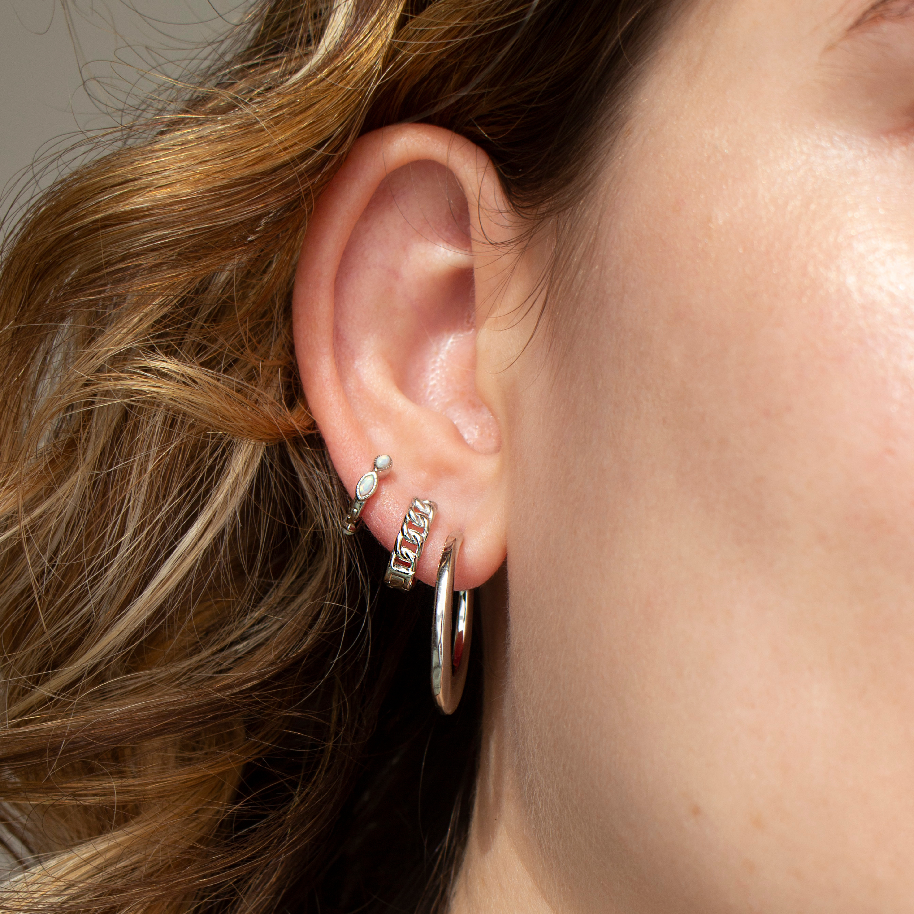 CORINNE HUGGIE SILVER